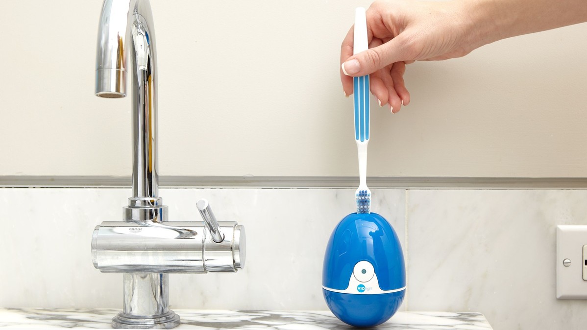 Toothbrush sanitizer