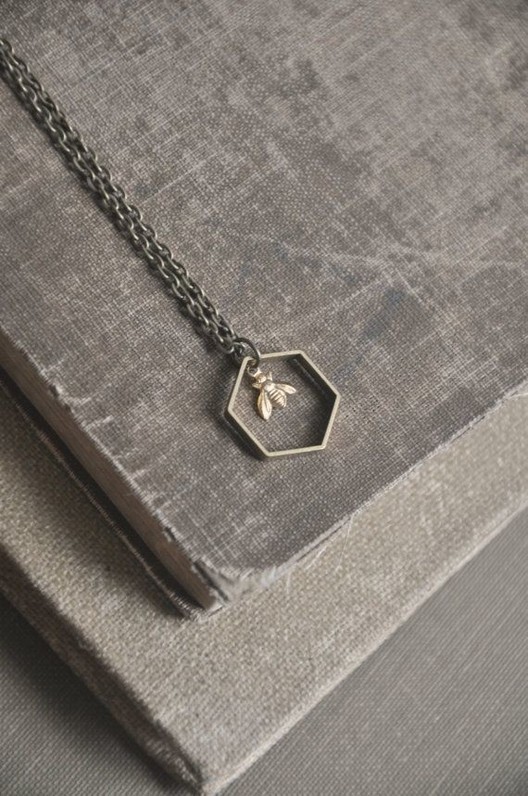tiny bee, a modern geometric nature inspired necklace.